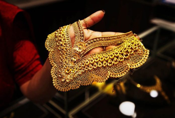 Gold-696x469 Gold Falls Rs 150 To Rs 88,750 Per 10g, Silver Declines Rs 250