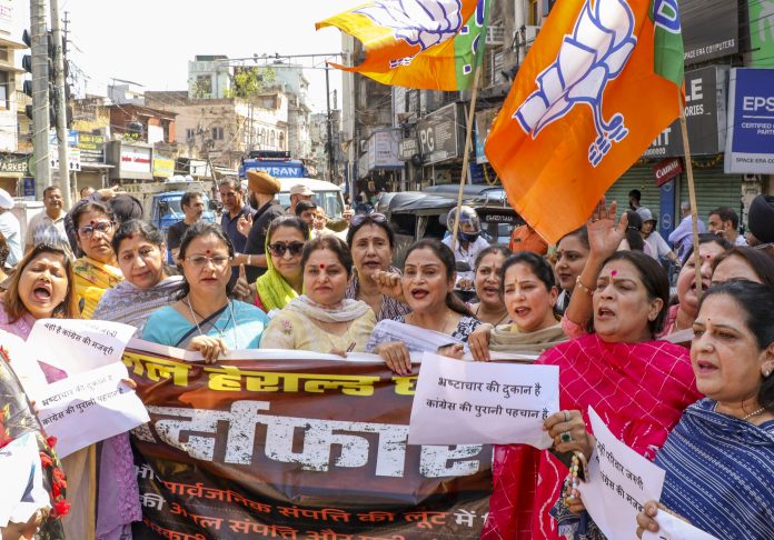 download-7-696x486 J&K BJP Holds Protest Against Cong, Says ED Chargesheet Against Gandhis Final Nail In Party’s Coffin